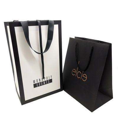 Покупки упаковывая прокатанный Tote бумаги искусства C1S кладут изготовленный на заказ логотип в мешки